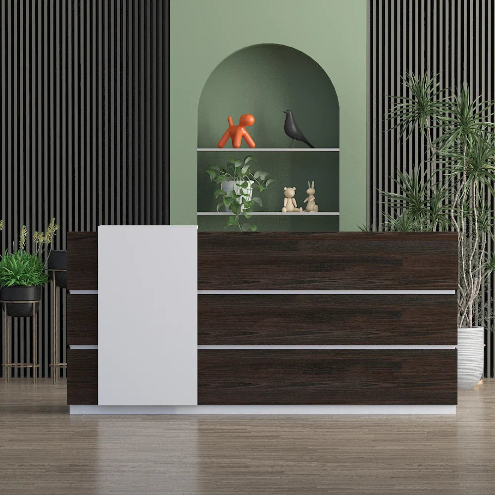 Modern reception table with dark wood finish and white accent panel in stylish office setting